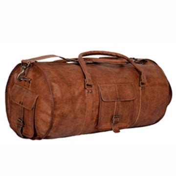 round shaped brown leather duffle bag